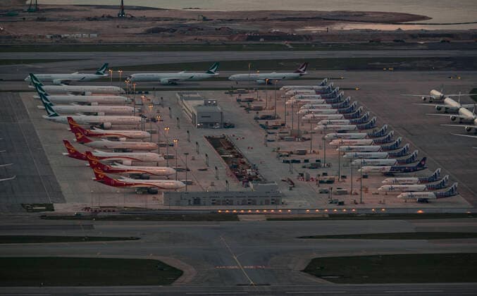 April 12, 2020, Hong Kong, China: Many aircraft parked at the Hong Kong International Airport. Airlines across the globe have cancelled flights, postponed or adjusted their services in response to the coronavirus outbreak. Hong Kong China - ZUMA 20200412_mda_j323_032 Copyright: xMayxJamesx