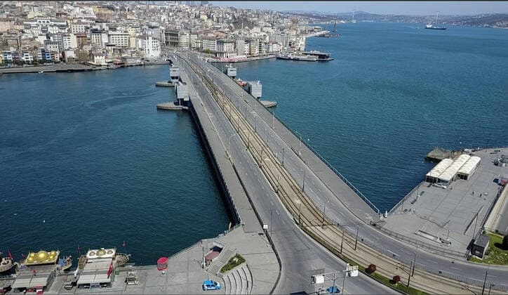 Normally busy but now mostly deserted Eminonu Square and Galata Bridge District at Historical Peninsula in Istanbul after the curfew declared by the government to slow coronavirus spread, Sunday, April 12, 2020. Copyright: TolgaxAdanali 16719034