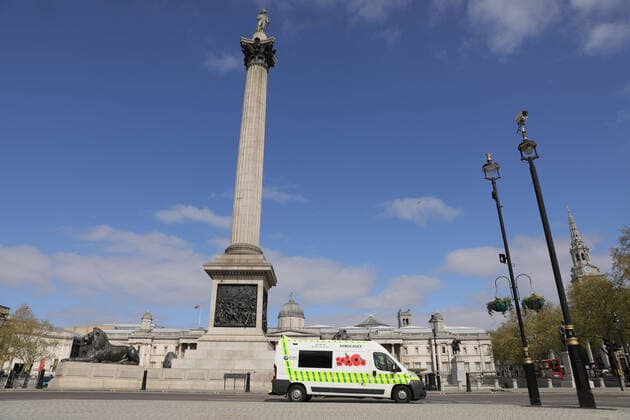 (200413) -- LONDON, April 13, 2020 (Xinhua) -- An ambulance drives through Trafalgar Square in London, Britain, April 13, 2020. The death toll of those hospitalized in Britain who tested positive for the novel coronavirus reached 10,612 as of Saturday afternoon, the Department of Health and Social Care said Sunday. (Photo by Tim Ireland Xinhua) BRITAIN-LONDON-COVID-19-DEATH TOLL 