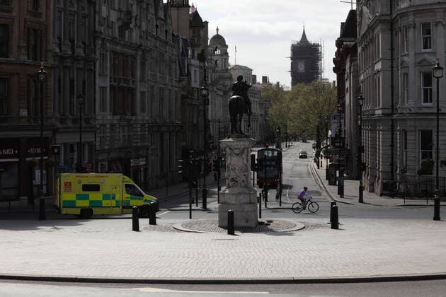 (200413) -- LONDON, April 13, 2020 (Xinhua) -- An ambulance drives through Trafalgar Square in London, Britain, April 13, 2020. The death toll of those hospitalized in Britain who tested positive for the novel coronavirus reached 10,612 as of Saturday afternoon, the Department of Health and Social Care said Sunday. (Photo by Tim Ireland Xinhua) BRITAIN-LONDON-COVID-19-DEATH TOLL 