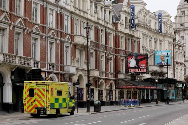 (200413) -- LONDON, April 13, 2020 (Xinhua) -- An ambulance is parked on Shaftesbury Avenue in London, Britain, April 13, 2020. The death toll of those hospitalized in Britain who tested positive for the novel coronavirus reached 10,612 as of Saturday afternoon, the Department of Health and Social Care said Sunday. (Photo by Tim Ireland Xinhua) BRITAIN-LONDON-COVID-19-DEATH TOLL 
