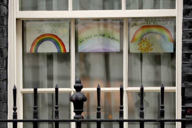 (200413) -- LONDON, April 13, 2020 (Xinhua) -- Pictures of rainbows with supportive messages are seen in the window of 10 Downing Street in London, Britain, April 13, 2020. The death toll of those hospitalized in Britain who tested positive for the novel coronavirus reached 10,612 as of Saturday afternoon, the Department of Health and Social Care said Sunday. (Photo by Tim Ireland Xinhua) BRITAIN-LONDON-COVID-19-DEATH TOLL 