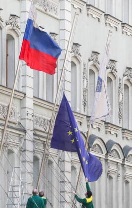 MOSCOW, RUSSIA - APRIL 13, 2020: Workers set up a European Union flag outside the Hotel Peter I. Alexander Shcherbak TASS  TS0D58F4