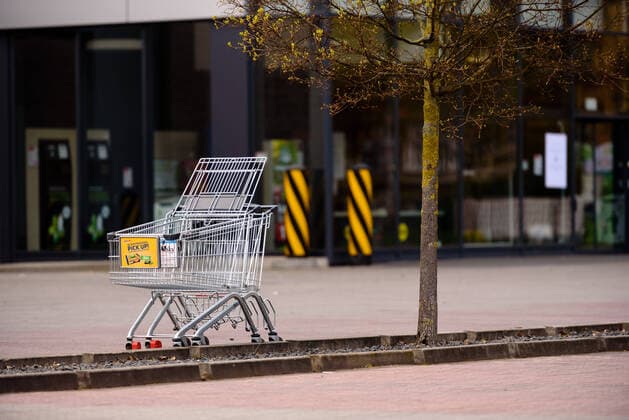 April 13, 2020: Shopping carts can be seen on an empty parking lot in front of a shopping mall.The German government has considerably restricted public life over the last weeks in order to slow down the spread of the Covid 19 pandemic. - ZUMAs172 20200413_zap_s172_007 Copyright: xJanxScheunertx