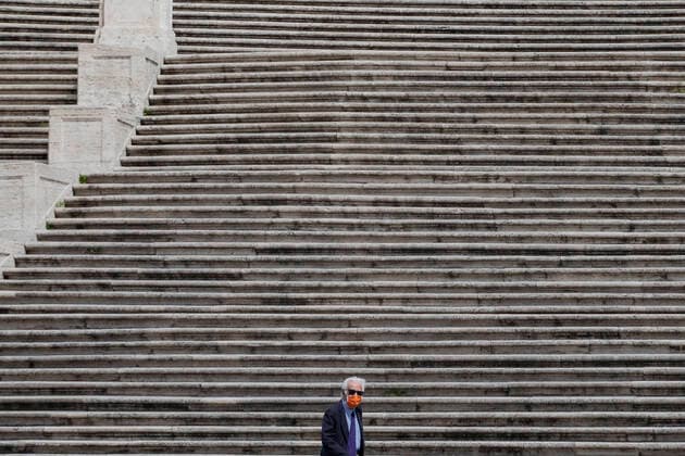 Coronavirus emergency in Rome A man walks at Spanish Steps. Empty streets in the city centre during Coronavirus (Covid-19) emergency in Rome. Rome Italy Italy Copyright: DavidexFracassi