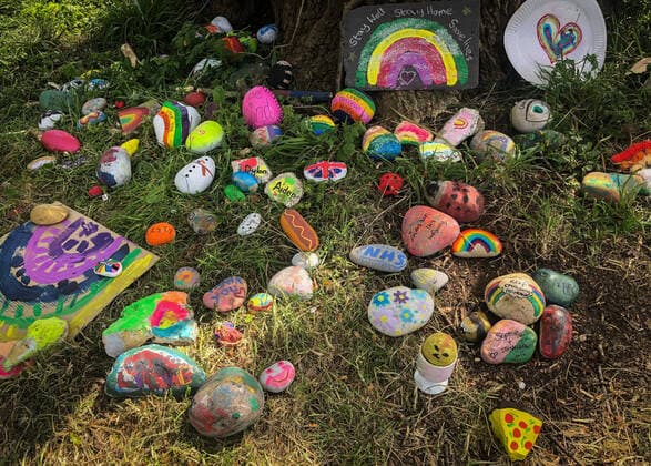 A tree is decorated by local residents in a village with positive messages and thank you to the NHS during Easter bank holiday Monday during the Covid-19 Pandemic as the UK Government advice to maintain social distancing and minimise time outside in High Wycombe on 13 April 2020. Copyright: xAndyxRowlandx PMI-3461-0012