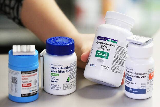 April 13, 2020, Davenport, Iowa, USA: A Pharmacist shows the variety of manufacturers providing Hydroxychloroquine Sulfate at Amicare Pharmacy on Utica Ridge Road in Bettendorf, Iowa Monday, April 13, 2020. Davenport USA - ZUMAq30_ 20200413_zaf_q30_005 Copyright: xKevinxE.xSchmidtx