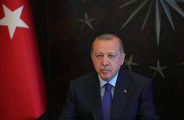 (200413) -- ISTANBUL, April 13, 2020 (Xinhua) -- Turkish President Recep Tayyip Erdogan delivers a speech after attending a cabinet meeting via teleconference in Istanbul, Turkey, on April 13, 2020. Erdogan on Monday announced a new two-day curfew which would be put into effect on April 17 to curb the spread of COVID-19. (Photo by Mustafa Kaya Xinhua) TURKEY-ISTANBUL-PRESIDENT-SPEECH-NEW CURFEW 