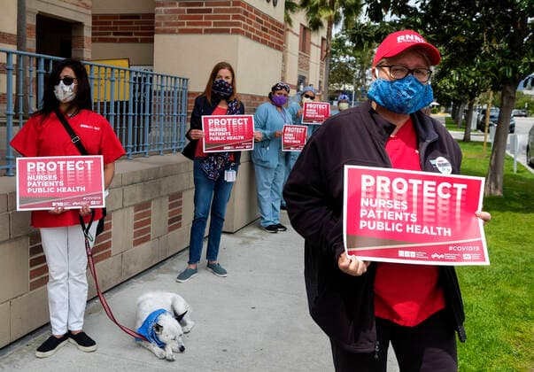 April 13, 2020, Los Angeles, California, U.S: Nurses and healthcare workers in a protest for the lack of personal protective equipment at UCLA Medical Center in Santa Monica, California, Monday April 13, 2020. Los Angeles U.S. - ZUMAc68_ 20200413_zaf_c68_013 Copyright: xRingoxChiux