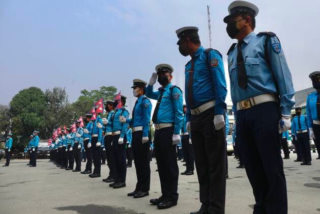 Nepal: Celebrating New Year 2077 B.S. They sang the national anthem with the flag of Nepal in their hands, lined up at the General Traffic Office during the celebration of Nepali New year 2077 B.S. Kathmandu Nepal Copyright: DipendraxDhungana