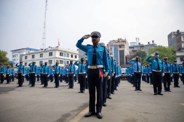 Nepal: Traffic police join a nationwide campaign Traffic Police officers join the country and play National Anthem from their work place to salute all the people on the front line: doctors, nurses delivery workers, cleaners, supermarket staffs and everyone else for keeping Nepal safe and stocked on this of global health crisis by COVID 19 to mark the Nepali New Year 2077 in Kathmandu Nepal, April 13, 2020. The country is on the third week of natonwide lockdown. Kathmandu Bagmati Nepal Copyright: SubashxShrestha