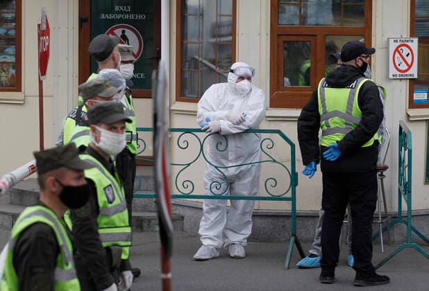 April 13, 2020, Kiev, Ukraine: Soldiers block the road at the entrance to Kyiv Pechersk Lavra in Kiev..Kyiv Pechersk Lavra shutdown for quarantine as the COVID-19 coronavirus hotbed. On 13 April 2020 Kyiv Mayor Vitaliy Klitschko has declared that the COVID-19 confirmed cases at the Kyiv Pechersk Lavra jumped to more than 90, including 63 cases confirmed over the past day. The Kyiv Pechersk Lavra, which is one the most important Orthodox shrines, since its foundation as the cave monastery in 1051, the Lavra has been a preeminent center of Eastern Orthodox Christianity in Eastern Europe. Kiev Ukraine - ZUMAs197 20200413_zaa_s197_186 Copyright: xPavloxGoncharx