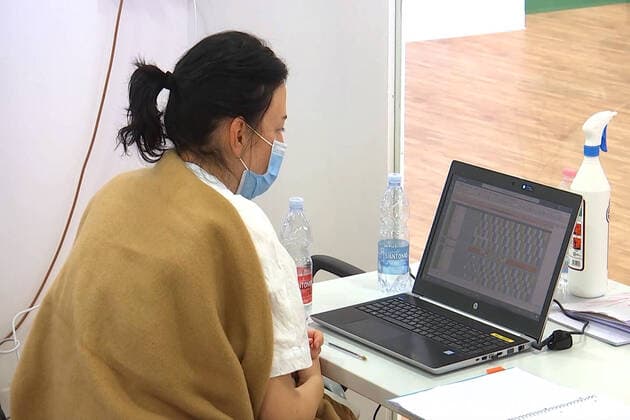 LOMBARDY, ITALY â€“ APRIL 14, 2020: A staff member at work in a field hospital in Bergamo where Russian medics join their Italian counterparts in treating coronavirus patients, 31 of them already admitted for treatment, eight cured of the COVID-19 infection. Russian Defence Ministry TASS  TS0D59B4