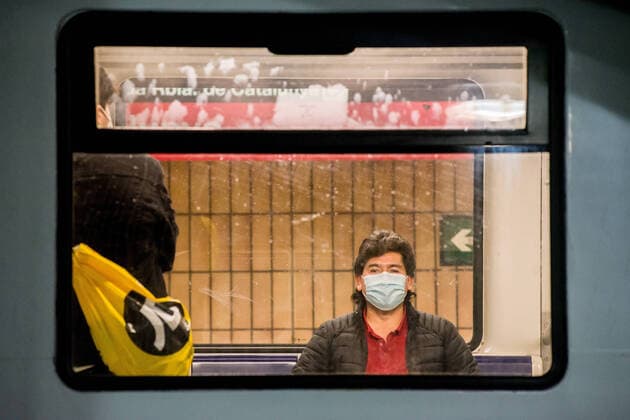April 14, 2020, Barcelona, Catalonia, Spain: A commuter wearing a protective face mask is seen in a subway wagon at Catalunya station in Barcelona. Thousands of people are returning to work after the Spanish government has lift the strictest measures of coronavirus confinement. Barcelona Spain - ZUMAb137 20200414_zap_b137_012 Copyright: xJordixBoixareux