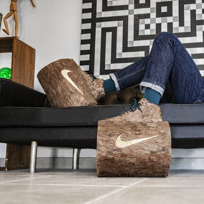 A quirky artist has created the ultimate footwear to make you stay at home during the current coronavirus crisis sneakers made of logs. French artist Monsieur Plant is known for making artworks from real plants and natural materials. He says he has isolated himself in his Brittany workshop to get closer to nature. His newly-created ?Stay Calm? shoes meld a sneaker with a log and add a cheeky Nike-inspired ?swoosh? logo. Monsieur Plant says he has chosen to translate this confinement in a quirky and humorous way as opposed to the media coverage of the Coronavirus COVID-19 . He explains: In the current situation, humanity is undergoing an unprecedented health crisis forcing us to be confined in order to limit the spread of the disease. I imagined sneakers that force us to stay at home. Working mainly with natural p Copyright: xx 40445174 EDITORIAL USE ONLY. NOT FOR USE BY NEWSPAPERS BASED IN THE UK.