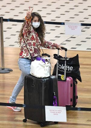 PERU COVID-19 REPATRIATION FLIGHT, A woman who is amongst a group of Australians evacuated from South America due to the coronavirus (COVID-19) is seen after landing at Brisbane International Airport in Brisbane, Tuesday, April 14, 2020. A Qantas flight from Lima, repatriated 115 passengers back to Australia. ( NO ARCHIVING, EDITORIAL USE ONLY, NO USE IN BOOKS WITHOUT CONSENT BRISBANE QLD AUSTRALIA  Copyright: xDARRENxENGLANDx 47187244st