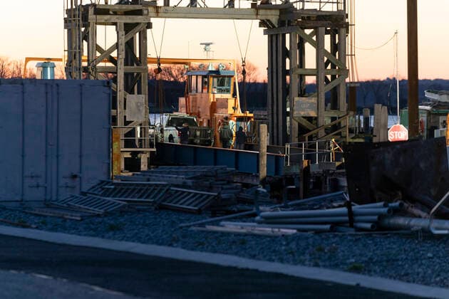 NYC buries unclaimed COVID-19 bodies on Hart Island Ferry carrying workers and equipment seen docked at City Island before departure to Hart Island where unclaimed COVID-19 bodies are buried New York New York United States Copyright: LevxRadin