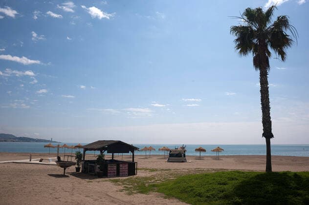 April 14, 2020, Malaga, Spain: Malagueta beach closed due to the confinement regulations amid coronavirus outbreak..Spaniards get back to their jobs after finishing the standstill of all work activities and services not essential due to the alarm state caused by the outbreak of coronavirus disease (COVID-19) in Spain. Malaga Spain - ZUMAs197 20200414_zaa_s197_076 Copyright: xJesusxMeridax