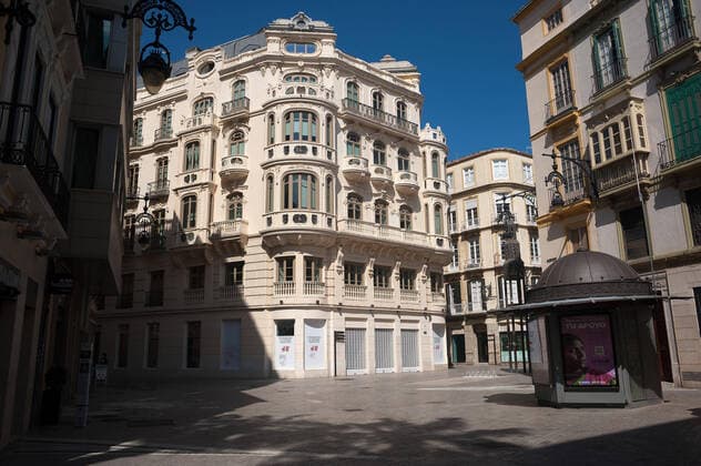 April 14, 2020, Malaga, Spain: An empty square due to the confinement regulations amid coronavirus outbreak..Spaniards get back to their jobs after finishing the standstill of all work activities and services not essential due to the alarm state caused by the outbreak of coronavirus disease (COVID-19) in Spain. Malaga Spain - ZUMAs197 20200414_zaa_s197_077 Copyright: xJesusxMeridax