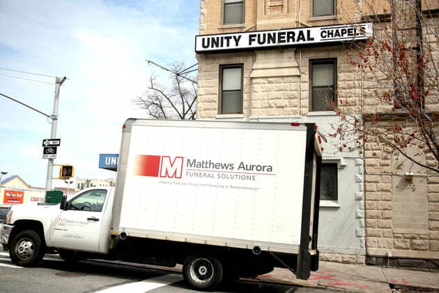 April 14, 2020, New York City, New York, US: With mostly empty streets, cleared sidewalks and shuttered businesses residents of the South Bronx have adjusted to life in the age of novel coronavirus (COVID19), while the borough is under a city-wide shelter-in place order. Pictured is a funeral supply delivery truck at a local funeral chapel. New York City US - ZUMAl135 20200414_zap_l135_005 Copyright: xG.xRonaldxLopezx