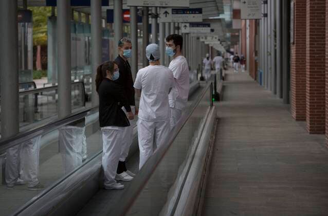 Coronavirus Outbreak COVID 19 Health workers at temporary field hospital for coronavirus patients installed at the IFEMA Fairgrounds of Madrid to unload the saturation on hospitals because to the COVID 19 pandemic Photo by Jose Cuesta 261 Cordon Press  JosexCuesta