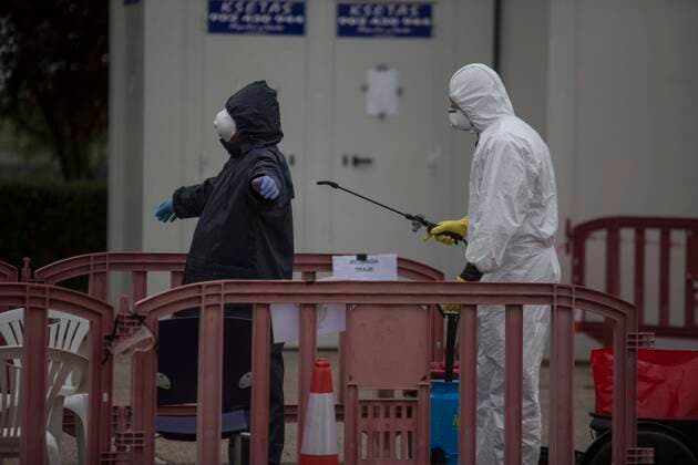 Coronavirus Outbreak COVID 19 Firefighters sterilize the ambulances and the drivers after the transport of patients at the temporary field hospital for coronavirus patients installed at the IFEMA Fairgrounds of Madrid to unload the saturation on hospitals because to the COVID 19 pandemic Photo by Jose Cuesta 261 Cordon Press Cordon Press  JosexCuesta