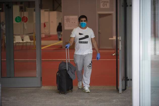 Coronavirus Outbreak COVID 19 A patient leaves the hospital after overcoming the illness at the temporary field hospital for coronavirus patients installed at the IFEMA Fairgrounds of Madrid to unload the saturation on hospitals because to the COVID 19 pandemic Photo by Jose Cuesta 261 Cordon Press  JosexCuesta