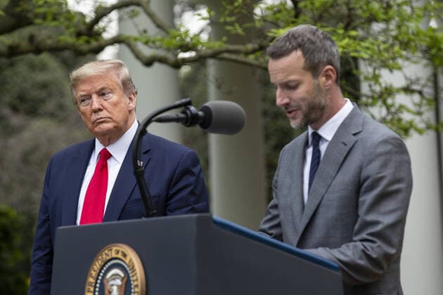 United States President Donald J. Trump listens as Adam Boehler, CEO of U.S. International Development Finance Corporation, delivers remarks during a news conference in the Rose Garden of the White House in Washington, DC on Tuesday, April 14, 2020. Trump announced that he has instructed his administration to halt funding to the World Health Organization (WHO).  WAX20200414227 STEFANIExREYNOLDS