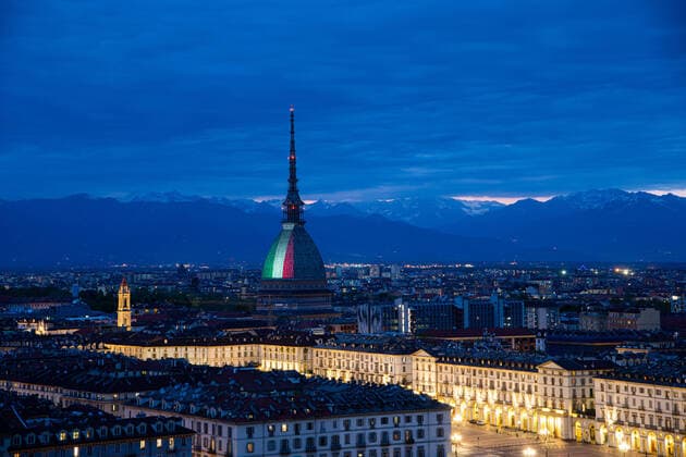Italy: Turin lockdown 14th April 2020 A view shows the Mole Antonelliana Turin with the colors of the Italian national flag to express solidarity and cohesion during COVID-19 emergencyon April 14, 2020 in Italy, during the c ountry s lockdown aimed at curbing the spread of the COVID-19 infection, caused by the novel coronavirus. Turin Piedmont Turin Italy Copyright: AlbertoxGandolfo