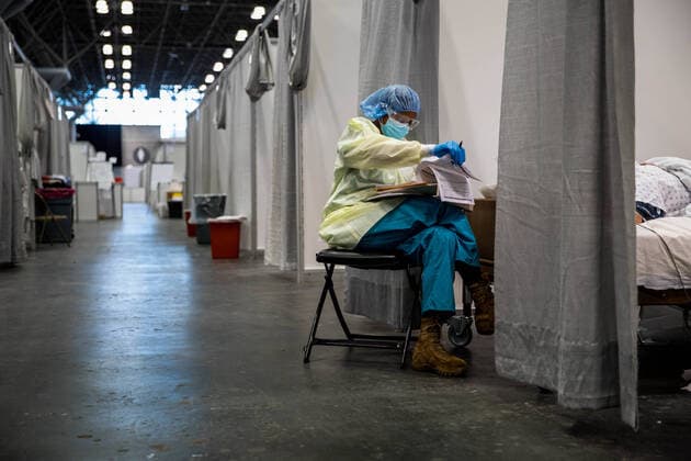 April 14, 2020, Manhattan, New York, United States Of America: NEW YORK (April 14, 2020) A medical provider assigned to the Javits New York Medical Station monitors a critically ill COVID-19 patient in the facilitys intensive care unit, April 11, 2020. U.S. Northern Command, through U.S. Army North, is providing military support to the Federal Emergency Management Agency to help communities in need. Manhattan United States Of America - ZUMAs214 20200414_zaa_s214_003 Copyright: xSMGx