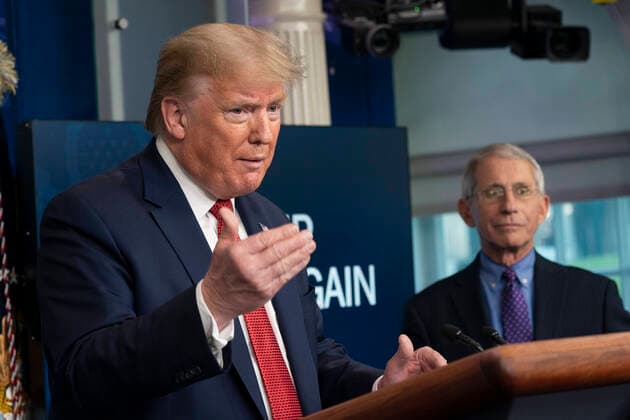 April 16, 2020, Washington, District of Columbia, USA: United States President Donald Trump participates in a news briefing with members of the Coronavirus Task Force at the White House in Washington, DC on April 16, 2020. Looking on at right is Director of the National Institute of Allergy and Infectious Diseases at the National Institutes of Health Dr. Anthony Fauci Washington USA - ZUMAs152 20200416_zaa_s152_083 Copyright: xChrisxKleponisx
