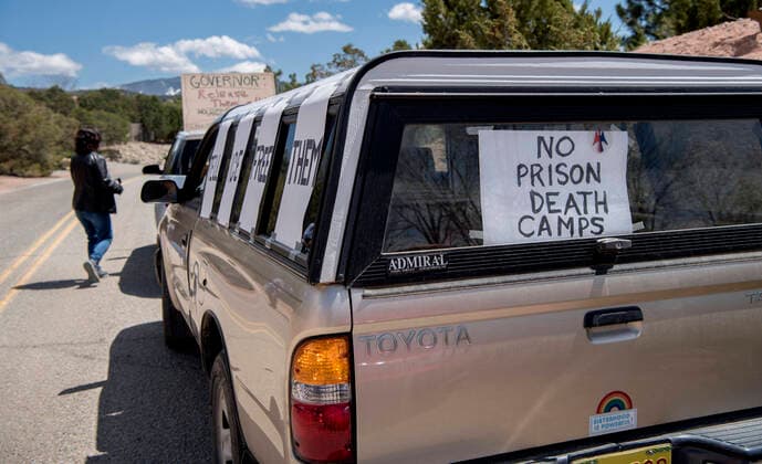 April 17, 2020, USA: A group of 13 vehicles protests outside the Governor s Mansion, Friday April 17, 2020, to send a message to the Governor to release all the inmates from the jails and prisons in the state due to the COVID-19 outbreak. They are also asking her to put pressure on ICE to release immigrants from detention. The group was lead by Bend the Arc New Mexico. USA - ZUMAab1_ 20200417_zaf_ab1_005 Copyright: xEddiexMoorex