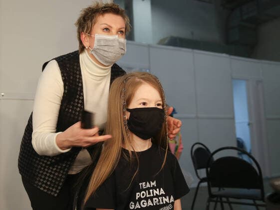 MOSCOW, RUSSIA - APRIL 17, 2020: A girl in a dressing room ahead of taking part in filming a live broadcast of an episode of The Voice Kids Russia reality television singing competition. The show is shot without audience amid the COVID-19 coronavirus pandemic. Vyacheslav Prokofyev TASS  TS0D62C3