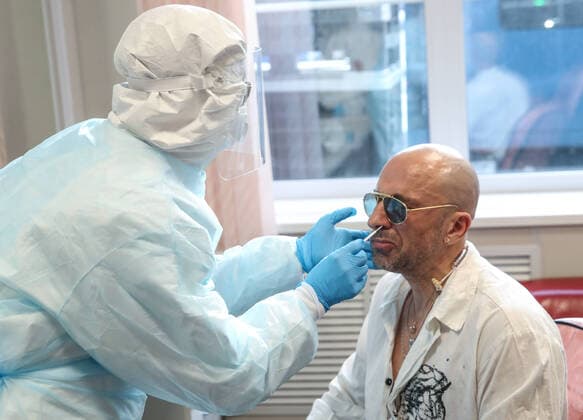MOSCOW, RUSSIA - APRIL 17, 2020: Actor and TV presenter Dmitry Nagiyev takes a coronavirus test ahead of filming a live broadcast of an episode of The Voice Kids Russia reality television singing competition. The show is shot without audience amid the COVID-19 coronavirus pandemic. Vyacheslav Prokofyev TASS  TS0D62C9