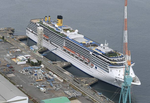 New coronavirus Photo taken from a Kyodo News helicopter on April 21, 2020, shows the Costa Atlantica cruise ship anchored at a port in Nagasaki, southwestern Japan. Testing continues after a novel coronavirus infection was confirmed the previous day on the vessel that docked at the port Jan. 29, carrying 623 crew members and no passengers. 