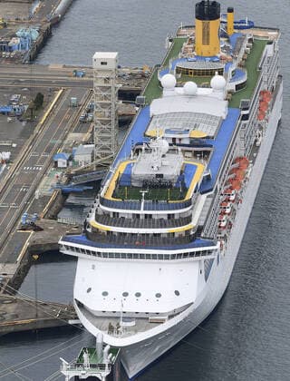 New coronavirus Photo taken from a Kyodo News helicopter on April 21, 2020, shows the Costa Atlantica cruise ship anchored at a port in Nagasaki, southwestern Japan. Testing continues after a novel coronavirus infection was confirmed the previous day on the vessel that docked at the port Jan. 29, carrying 623 crew members and no passengers. 