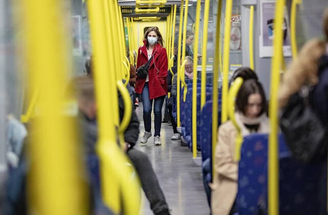 Stockholm metro during the corona crisis The number of passengers has decreased, but many still have no choice but to travel by public transport Picture Woman wearing a face mask Stockholm Sweden x2512x,  Copyright: xSANDBERGxMAGNUS Aftonbladetx SWEDEN CORONA METRO