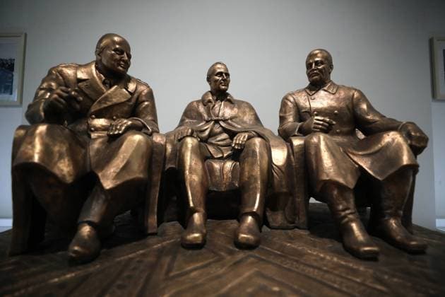 MOSCOW, RUSSIA - APRIL 24, 2020: The Big Three sculpture on display at the exhibition titled Stalin, Churchill, Roosevelt: the Common Struggle against Fascism , which is held at Russiaâ€™s Federal Archival Agency. Supported by the Russian Presidential Grants Foundation, the exhibition shows the key documents and items in the formation of the Allies of World War II during the Great Patriotic War 1941â€“1945 (the Eastern Front of World War II). Mikhail Tereshchenko TASS  TS0D7258