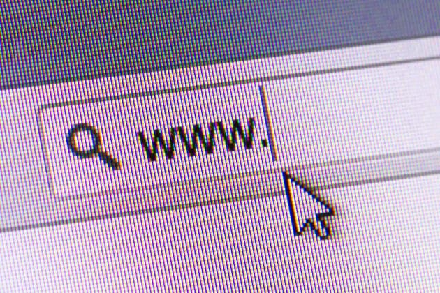 WWW Text in Address Bar Mouse arrow pointing internet browser address bar with www text, close up of computer screen.  Copyright: xniglaynikex 9892692