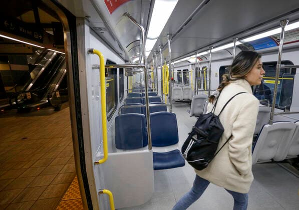 (200427) -- VANCOUVER, April 27, 2020 (Xinhua) -- A passenger walks into an empty train at a Skytrain station in Vancouver, Canada, April 27, 2020. Metro Vancouver s transportation authority TransLink announced on Monday that it is laying off 1,492 workers with further reduction in services due to the massive downturn in ridership during the COVID-19 pandemic. As of Monday afternoon, there were 48,230 confirmed COVID-19 cases in Canada and 2,701 deaths. (Photo by Liang Sen Xinhua) CANADA-VANCOUVER-COVID-19-JOB CUTS 