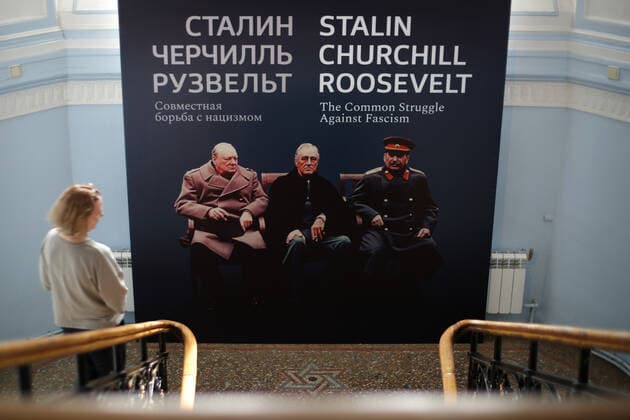 MOSCOW, RUSSIA - APRIL 24, 2020: A visitor views a poster at the exhibition titled Stalin, Churchill, Roosevelt: the Common Struggle against Fascism , which is held at Russiaâ€™s Federal Archival Agency. Supported by the Russian Presidential Grants Foundation, the exhibition shows the key documents and items in the formation of the Allies of World War II during the Great Patriotic War 1941â€“1945 (the Eastern Front of World War II). Mikhail Tereshchenko TASS  TS0D74C1