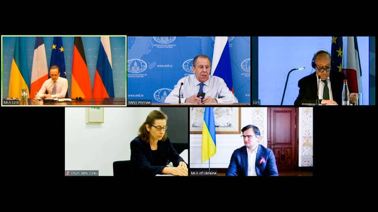 MOSCOW, RUSSIA - APRIL 30, 2020: The video screen shows Germany s Federal Minister for Foreign Affairs Heiko Maas, Russia s Minister of Foreign Affairs Sergei Lavrov, France s Minister for Europe and Foreign Affairs Jean-Yves Le Drian (L-R top), and Ukraine s Minister of Foreign Affairs Dmytro Kuleba (bottom R) during a Normany Four summit of foreign ministers held via a videoconference link. Talks in the so-called Normandy Four format involve representatives of Ukraine, Germany, France and Russia who discuss settlement of the conflict in eastern Ukraine. Ministry of Foreign Affairs of the Russian Federation  xpoolx Russia s Minister of Foreign Affairs Lavrov attends Normandy Four summit via videoconference link *** MOSCOW, RUSSIA APRIL 30, 2020 The video screen shows Germany s Federal Minister for Foreign Affairs Heiko Maas, Russia s Minist