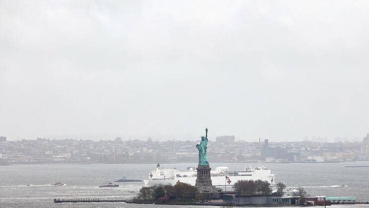 April 30, 2020, New York City, NEW YORK, USA: Hospital Ship USNS COMFORT set sail from New York City today after deploying there to help with the coronavirus pandemic. The USNS COMFORT is seen here leaving the NY Harbor on its next life-saving mission. It is heading back to its home port, the U.S. Naval Station; Norfolk in Virginia, where it s expected to undergo maintenance, restock and prepare for deployment on the next mission. The floating military hospital arrived in New York Harbor on March 30. It arrived at the U.S. epicenter of the novel coronavirus greeted with the fanfare reserved for the cavalry coming to the rescue and after treating 182 people the USNS Comfort discharged its last patient in New York City on Sunday. ..The sole remaining patient aboard the hulking 894-foot-long floating military hospital left the ship on Sund - ZUMAj15_ 20200430_zap_j15_017 Copyright: xJodixJonesx