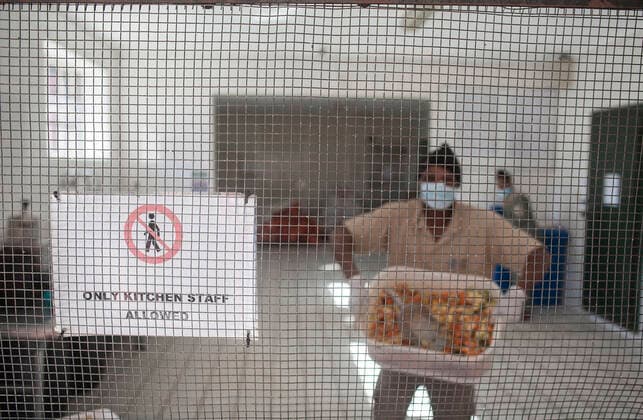 (200502) -- JOHANNESBURG, May 2, 2020 (Xinhua) -- A staff member prepares food for animals at the Johannesburg Zoo in Johannesburg, South Africa, on May 1, 2020. The zoo has been closed since March 26 due to the COVID-19 pandemic. (Photo by Shiraaz Mohamed Xinhua) SOUTH AFRICA-JOHANNESBURG-ZOO-COVID-19-CLOSE 
