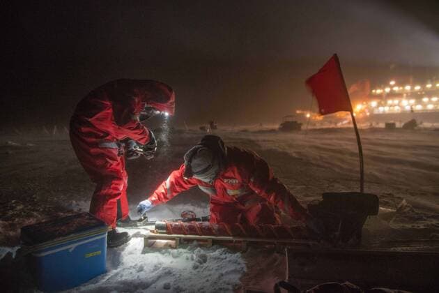 December 4, 2019, Arctic Sea, Arctic: LEI WANG (R) and MICHAEL ANGELOPOLOUS (L) take ice cores on the sea ice. MOSAiC is the largest polar expedition in history: in September 2019, the German research icebreaker Polarstern has set sail from Tromso, Norway, to spend a year drifting through the Arctic Ocean, trapped in ice. The goal of the MOSAiC expedition is to take the closest look ever at the Arctic as the epicenter of global warming and to gain fundamental insights that are key to better understand global climate change. Hundreds of researchers from 20 countries are involved in this exceptional endeavor. Following in the footsteps of Fridtjof Nansen s ground-breaking expedition with his wooden sailing ship Fram in 1893-1896, the MOSAiC expedition will bring a modern research icebreaker close to the north pole for a full year including - ZUMAz03_ 20191204_arc_z03_074 Copyright: xEstherxHorvathx