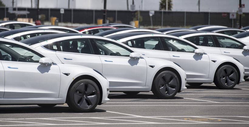 Cars sit on a Tesla parking lot in Fremont, California on Sunday, May 10, 2020. Shelter in place orders because of coronavirus have closed Fremont plant. In a series of tweets Saturday, Tesla CEO Elon Musk threatened to move the company s headquarters to Texas or Nevada, where shelter-in-place rules are less restrictive.  SXP2020051018 TERRYxSCHMITT