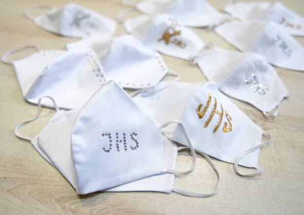 Wedding and First Communion face masks are made during the coronavirus outbreak in Poland Wedding and First Communion face masks are made during the coronavirus outbreak by Elus sewing workshop on May 12, 2020 in Jaroslaw, Poland. EN_01428317_0002 