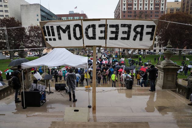 May 14, 2020, Lansing, MI, USA: People gather Thursday, May 14, 2020, at the Michigan Capitol in Lansing to protest Gov. Gretchen Whitmer s stay-at-home order. Lansing USA - ZUMAm67_ 20200514_zaf_m67_021 Copyright: xKimberlyxPxMitchellx