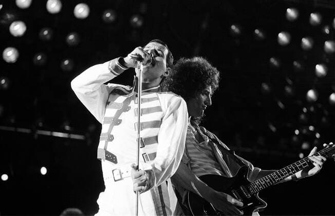 IMAGO ICONS: Freddie Mercury 1 Konzert 86: Queen, Freddie Mercury á(voc), Brian May (g), Rock, Musik, *** 1 concert 86 Queen, Freddie Mercury á voc , Brian May g , rock, music, Copyright: xHeinrichx BriganiArt_00010501_00010501