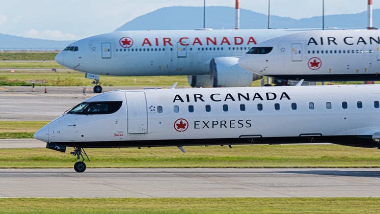 May 15, 2020, Richmond, British Columbia, Canada: Air Canada jets at Vancouver International Airport on May 15, 2020, the day Air Canada announced their decision to lay off approximately 20,000 employees in June. Richmond Canada - ZUMAs202 20200515_zap_s202_001 Copyright: xBaynexStanleyx